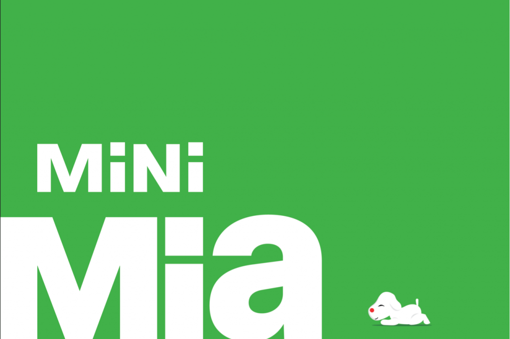 Green promotional graphic with large white text reading “Mini Mia” and a small illustrated white dog with a red nose in the bottom right corner.